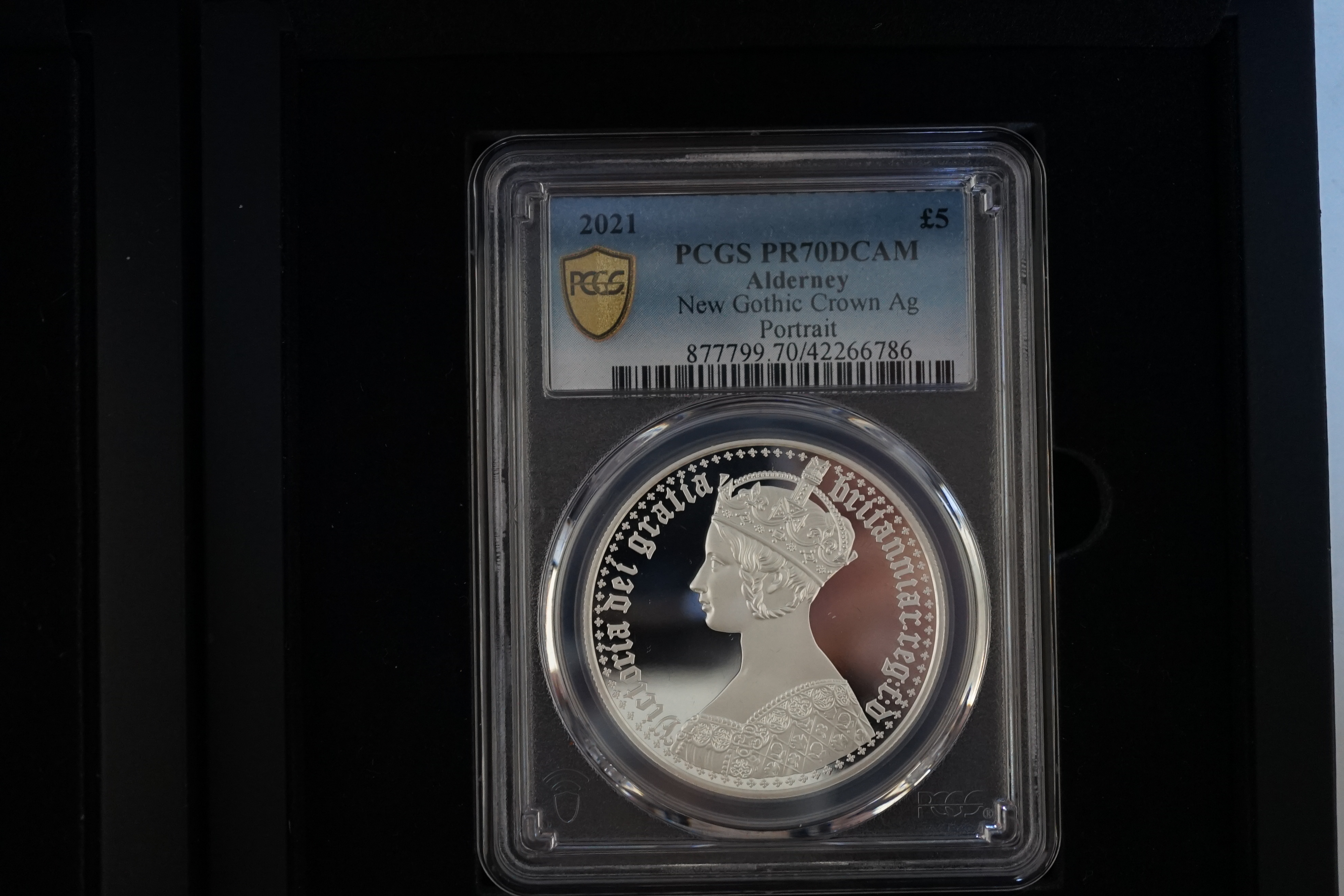 Elizabeth II proof silver coins, two 2021 Alderney QEII New Gothic crown proof silver £5 coins, Queen Victoria portrait and Gothic cruciform Shields reverse, both PCGS slabbed and graded PR70DCAM and a UEFA Euro 2020 Sol